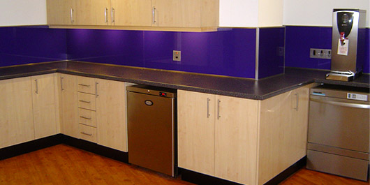 Kitchen with purple splashbacks at Project Grace